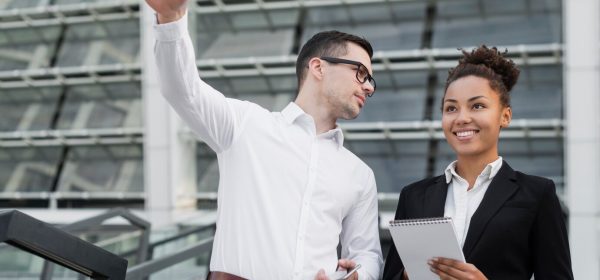 handsome-man-with-glasses-pointing-side_23-2148336929